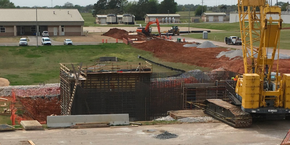 Heavy equipment digging in dirt