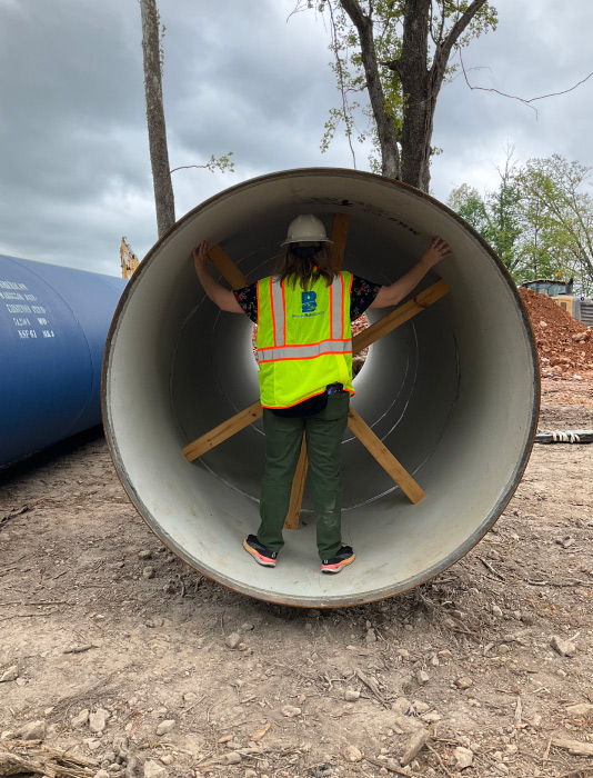 Public Affairs Director Trish Ouei has been waiting to walk into the 72-inch pipe since the first segments arrived. At almost 5'7