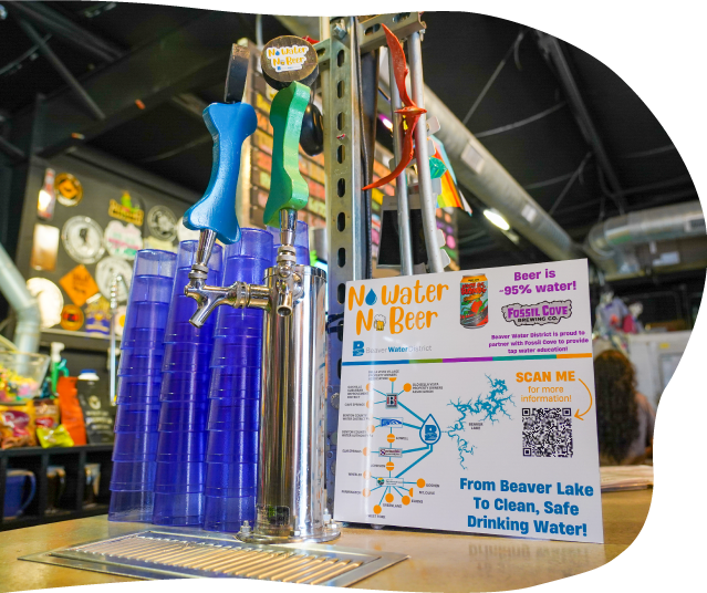 No Water No Beer sign next to beer tap dispenser