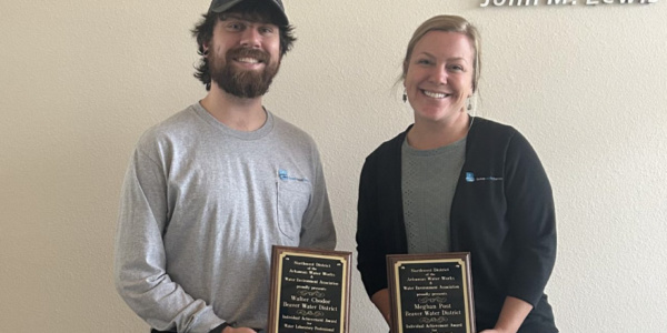 Meghan Post and Walter Chodor receiving awards